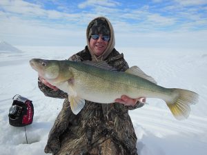 Ice fishing angler